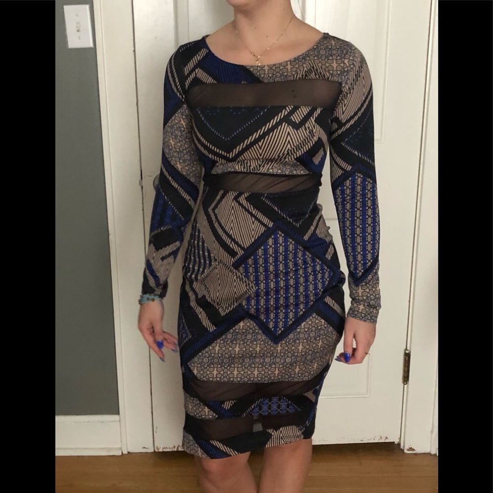 Multicolored dress with mesh cutouts.